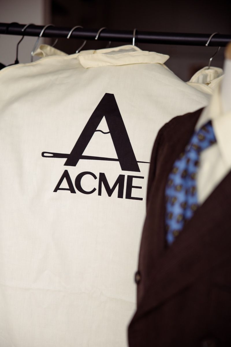 ACME garment bag on the rail &mdash; ready for delivery