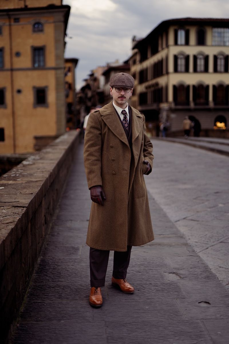 Bespoke polo coat on a stone bridge in Florence