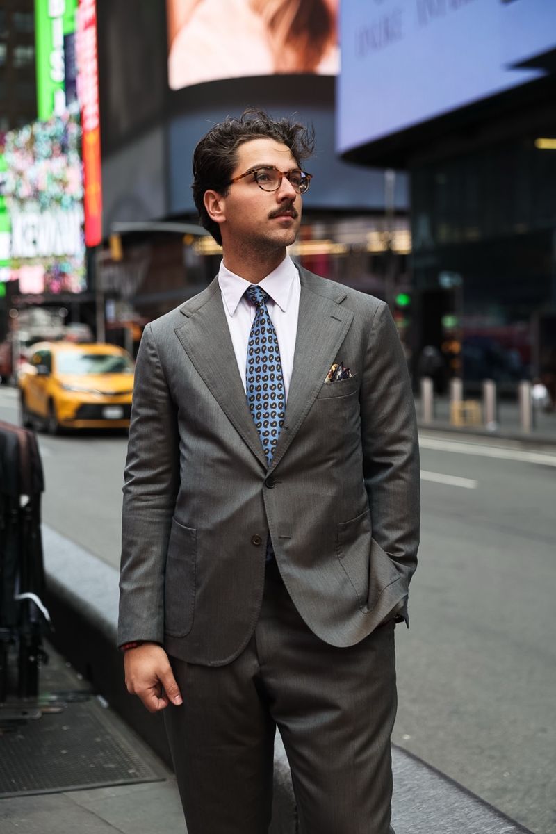 Bespoke gray suit photographed in Times Square, New York