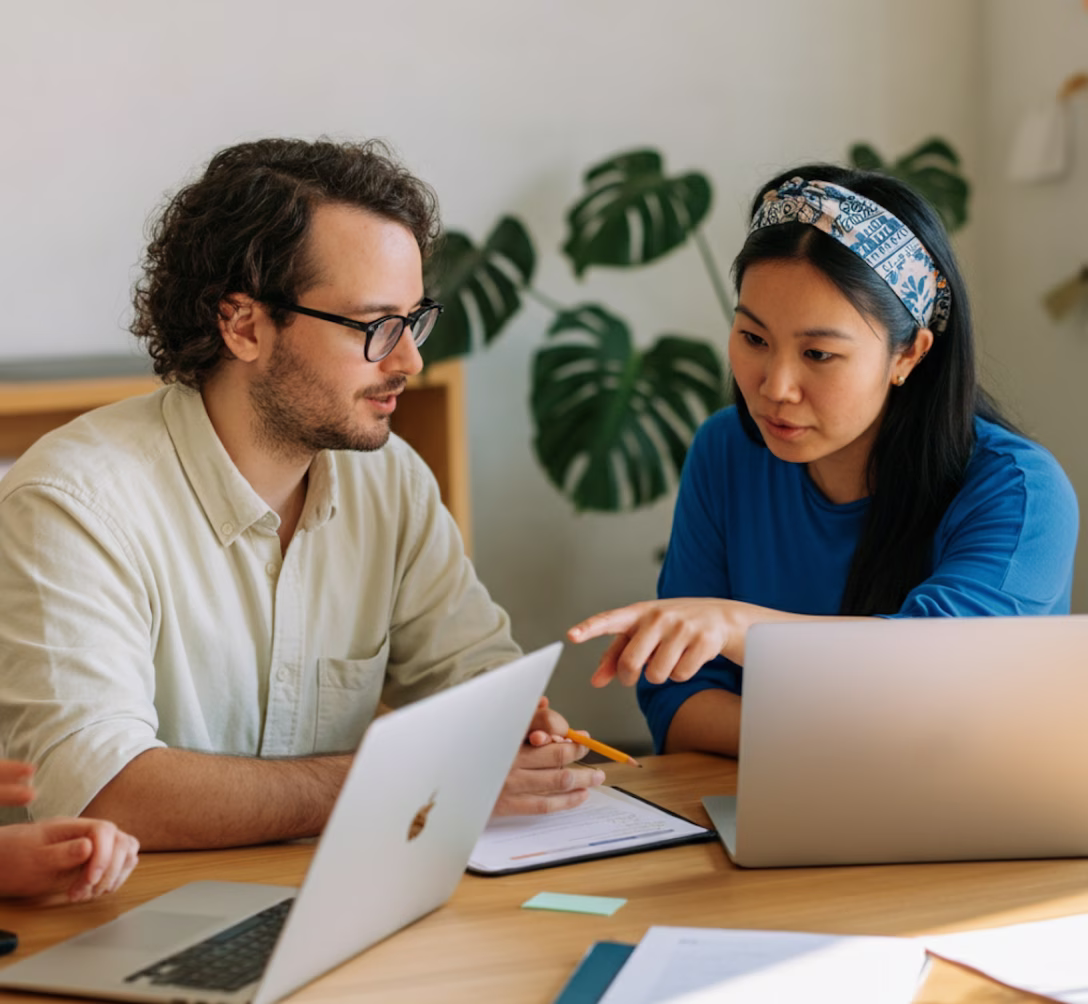 Two people discussing tax matters.