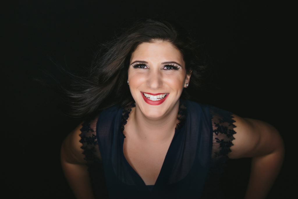 Headshot of brunette smiling in dark navy top; Boudoir Photography by Lindsay Hite