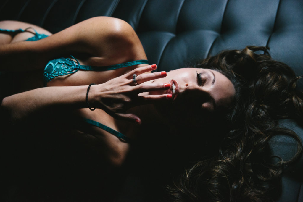 boudoir photo woman in teal outfit