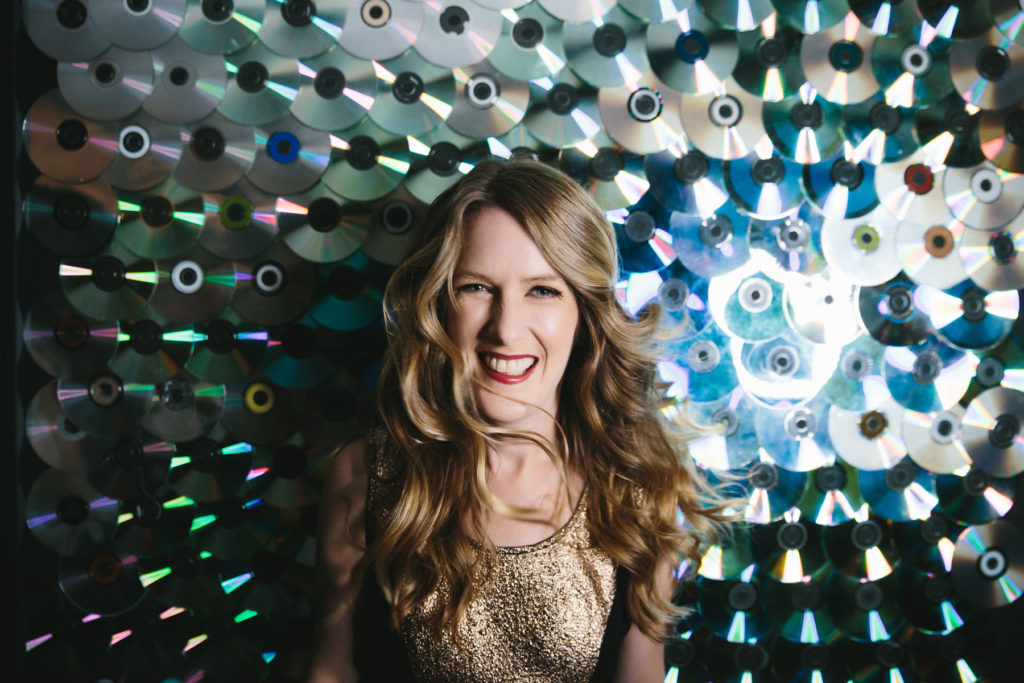 woman in front of CD Wall; Time to Celebrate, boudoir photography by Lindsay Hite