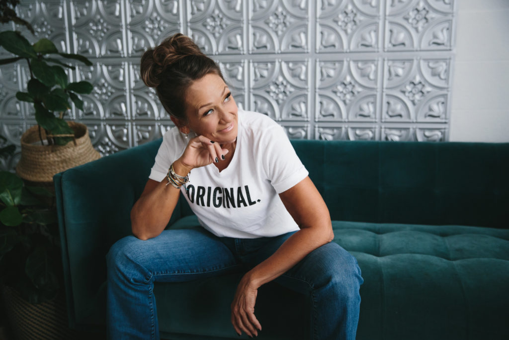 Casual headshot, woman in t-shirt and jean; women's empowerment photography by Lindsay Hite