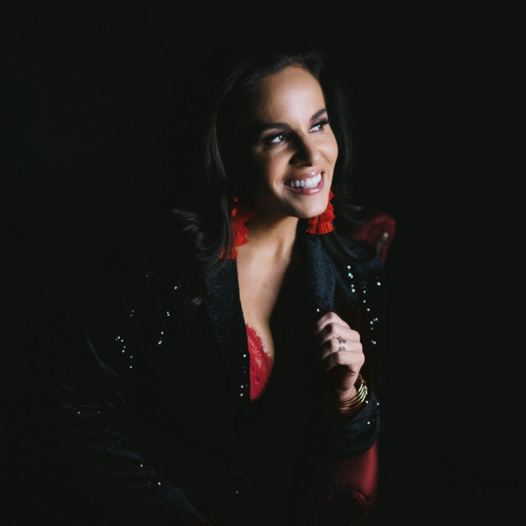 woman in powersuit; self care: an investment in future generations; photography by Lindsay Hite