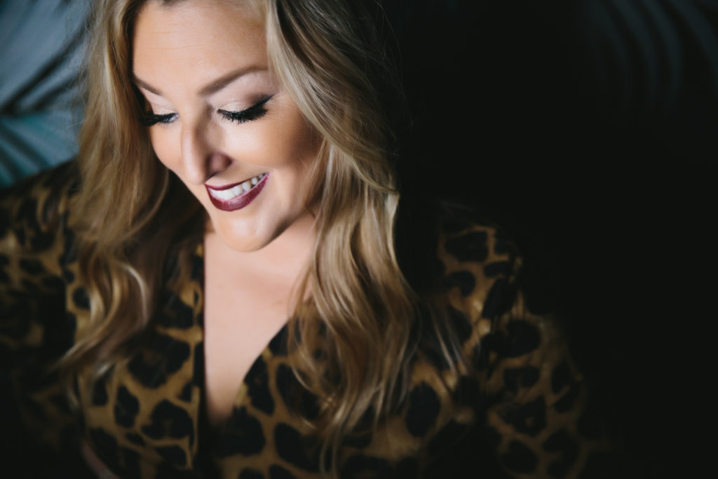 woman in animal print dress, photography by Lindsay Hite