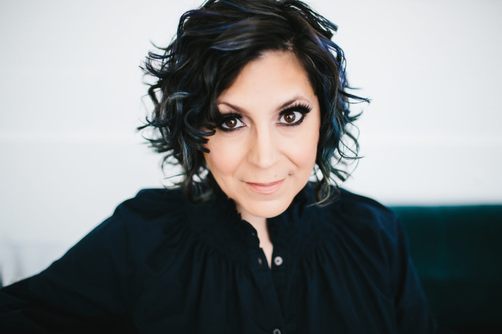 Boston-Area Luxury Photography Studio, Jen Production Manager in black long sleeved top with white background