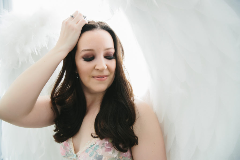 Woman with angel wings, boudoir photography by Lindsay Hite