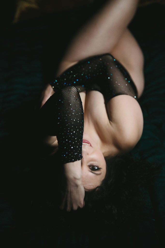 woman in sparkly body suit; boudoir photography by Lindsay Hite
