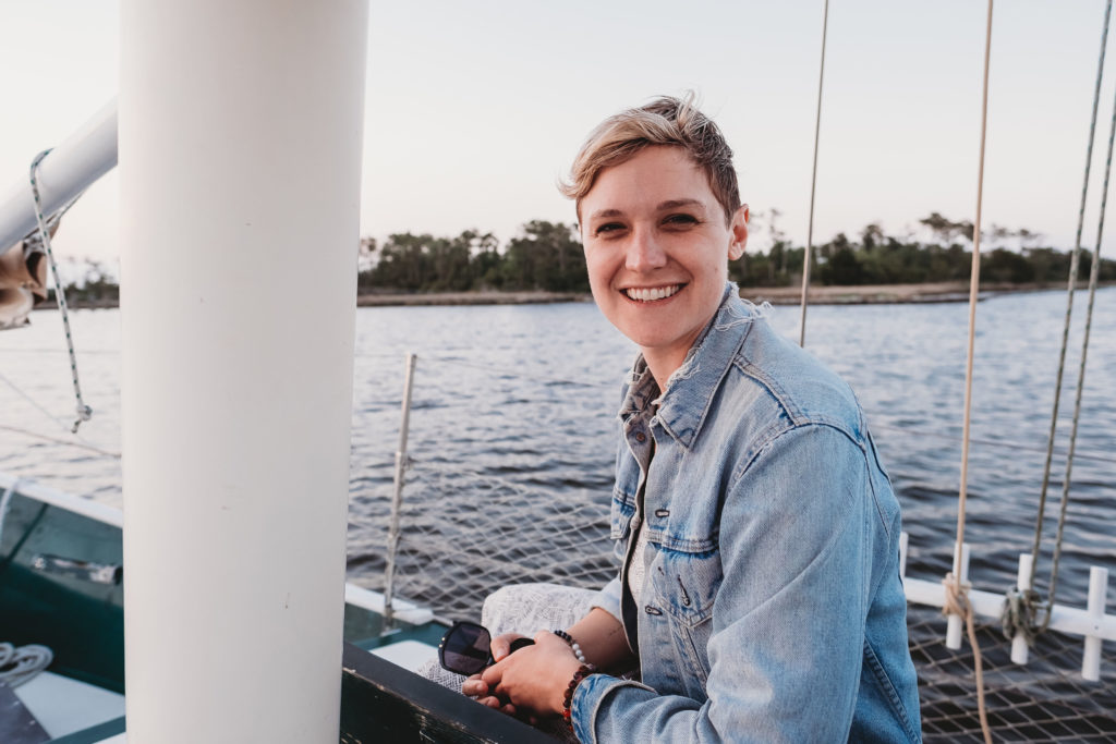 Founder and photography for Show Your Spark on a boat