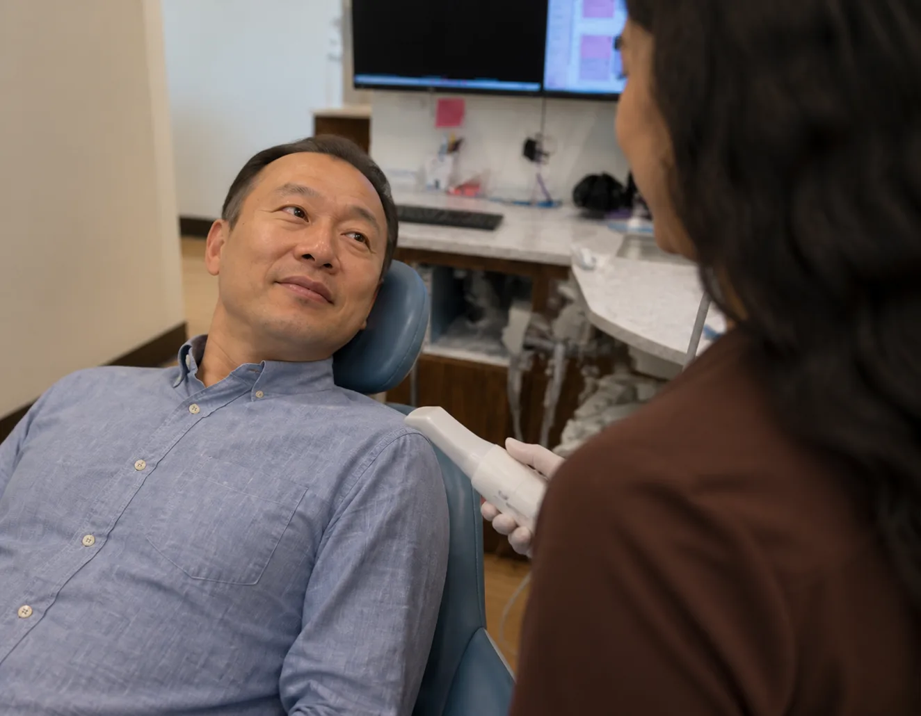 Patient preparing for a digital dental implant scan at Rinse Dental