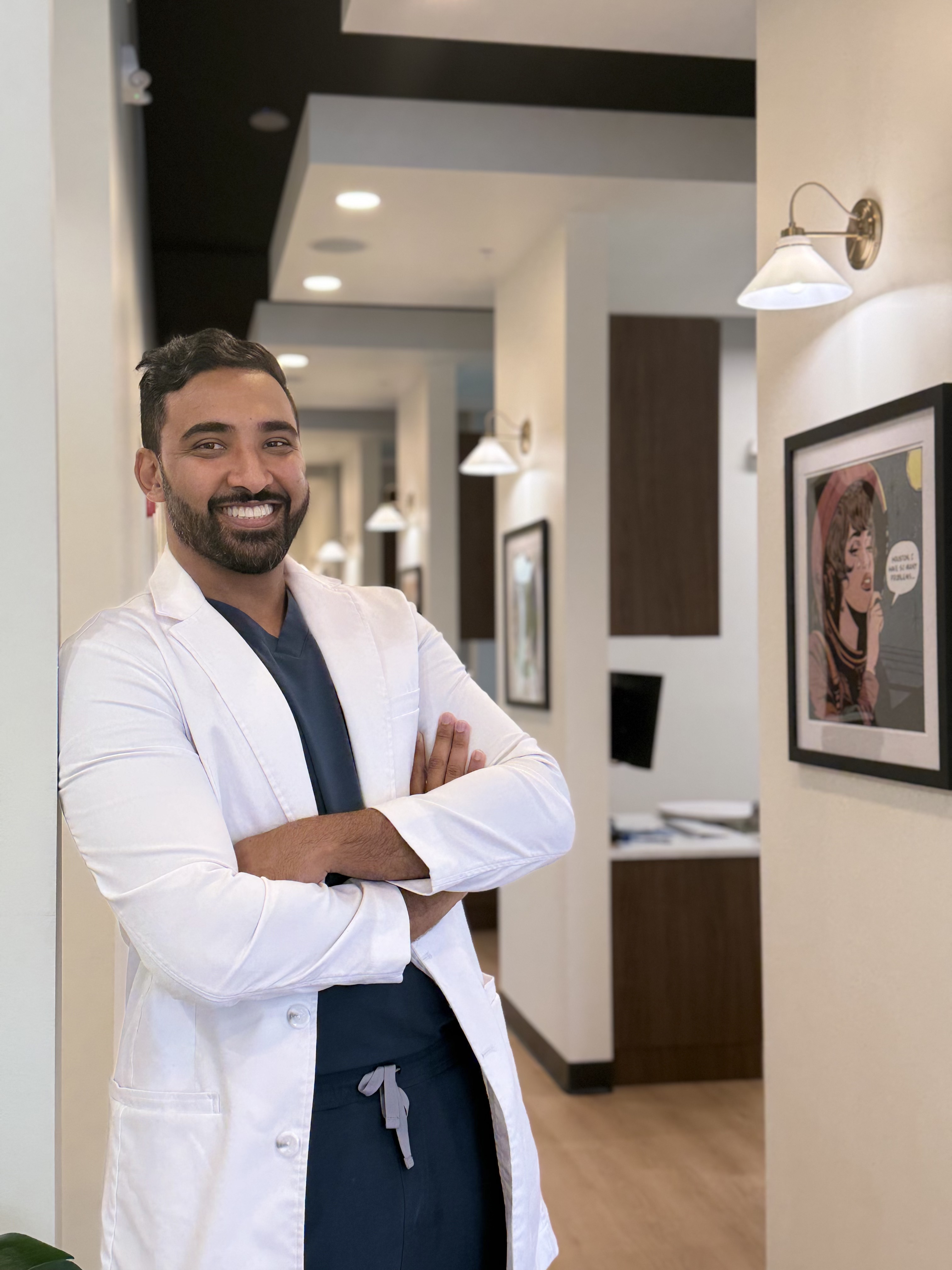 Patient reviewing a porcelain veneer plan at Rinse Dental