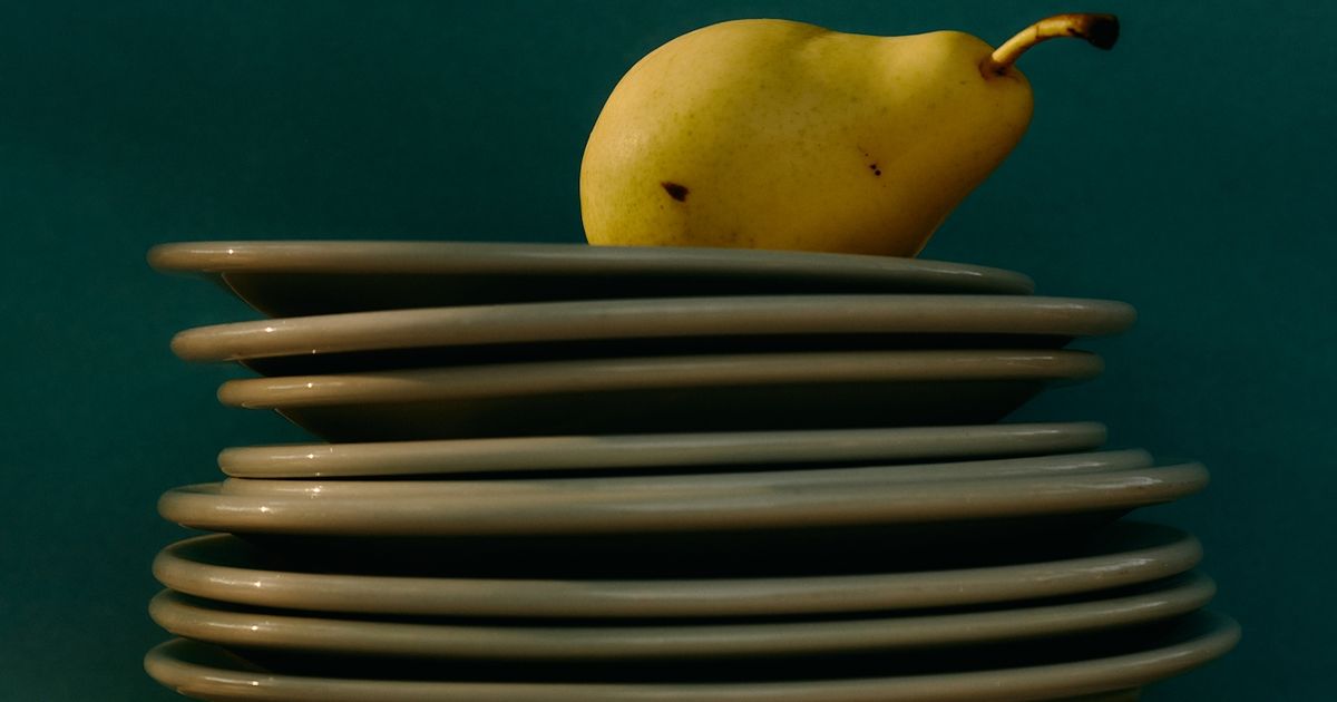 Functional supplement bottles stacked on a clean surface