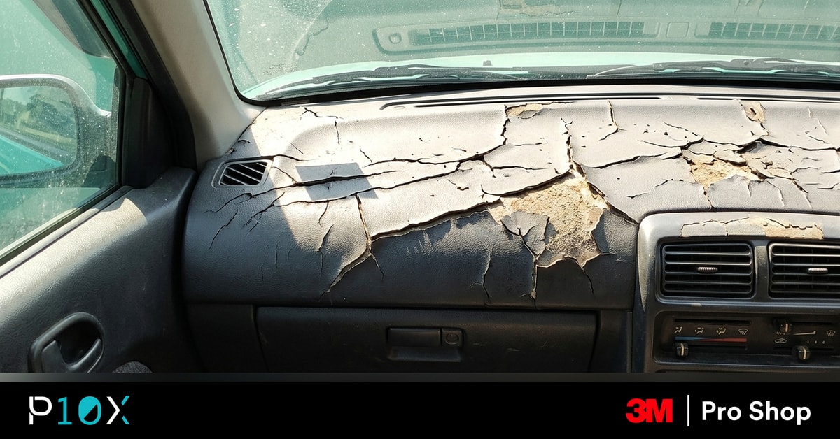 Dashboard cracking Malaysia UV protection showing sun rays hitting a cracked car dashboard through the side window