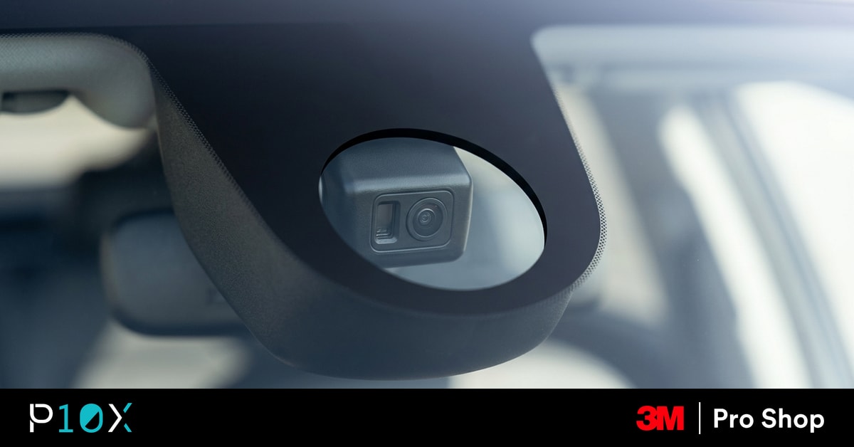 Windshield ADAS camera with a clear film cutout showing whether window tint affects ADAS