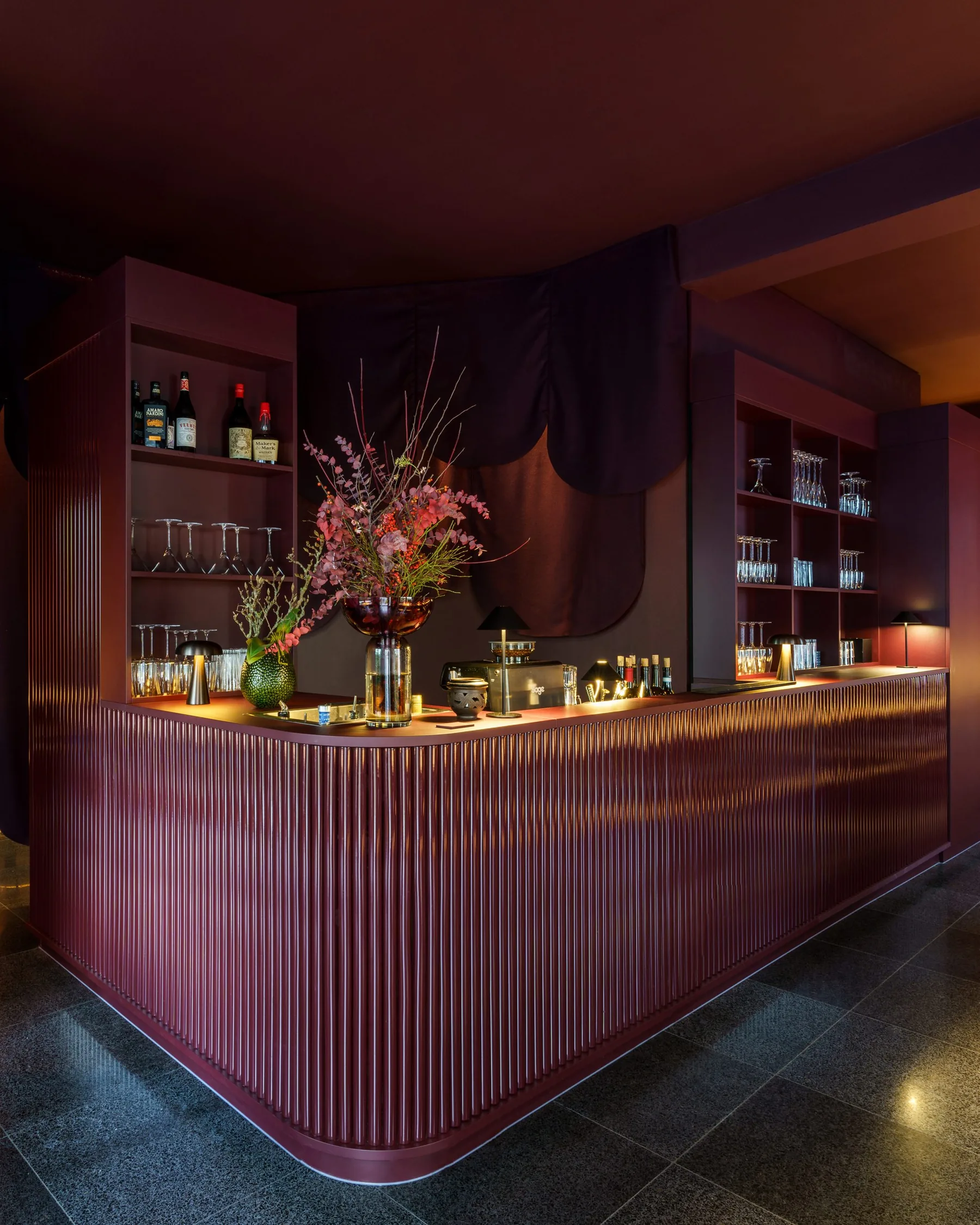 The bar at Umbra in Frankfurt's Westend, lit for the evening