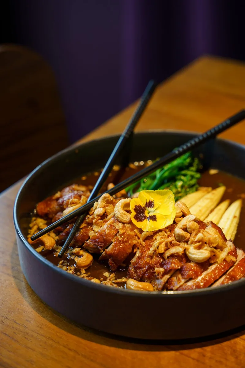 Ped Makham: crispy duck with tamarind sauce and cashew nuts