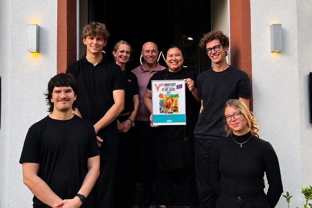 The Umbra team at the restaurant entrance