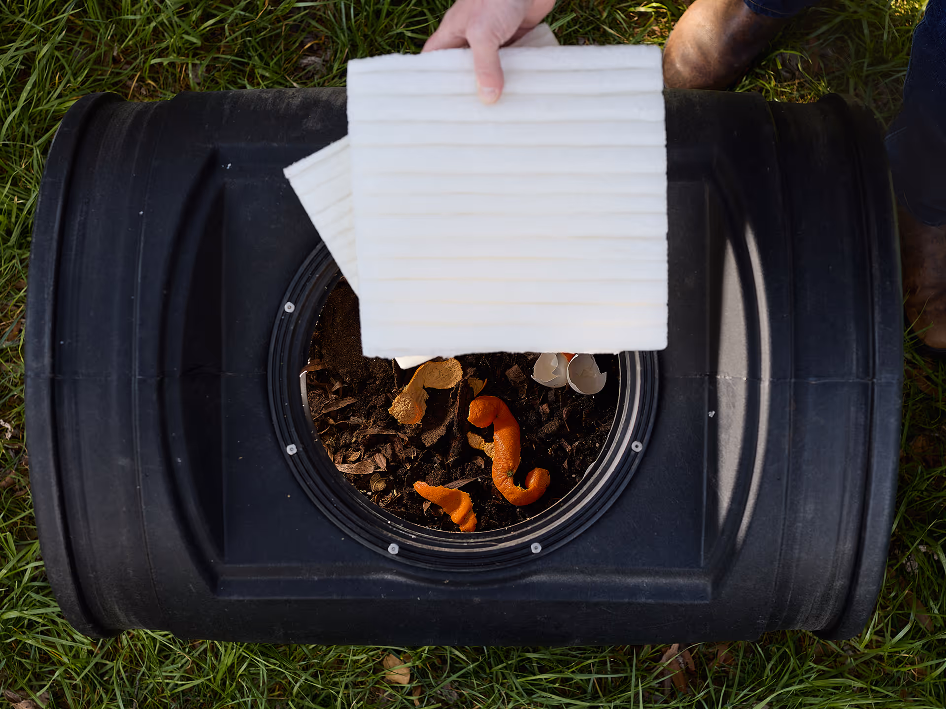 Green Cell Foam panels going into a compost bin. 