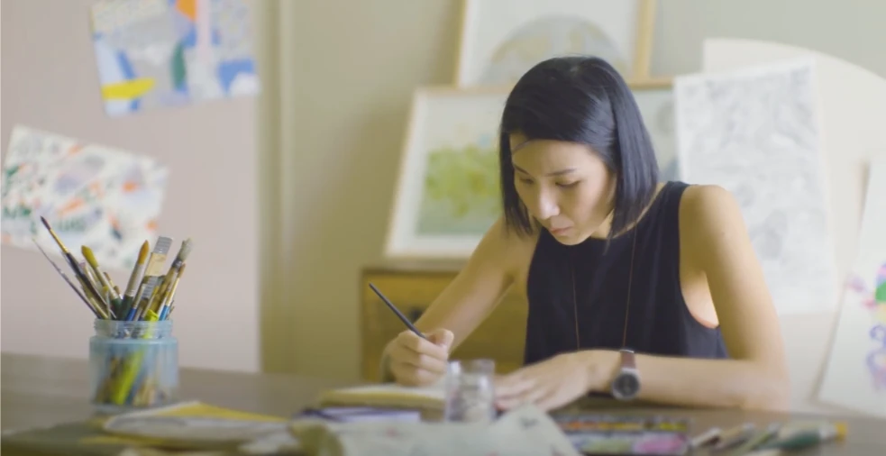 Prudential Pursue influencer video featuring multimedia artist Tan Zi Xi sharing her creative journey and career in the arts