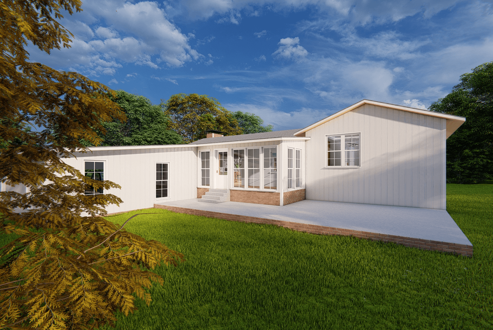 Single-story white house with large windows, a small patio, and green lawn surrounded by trees under a partly cloudy blue sky.