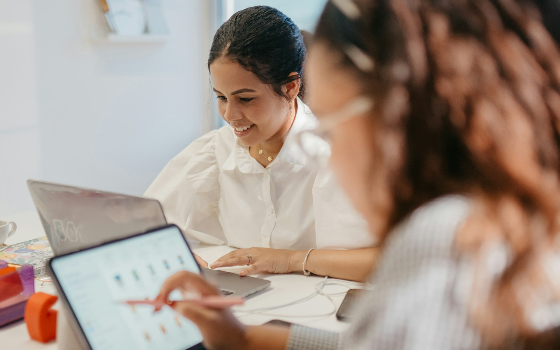 Engaged employees collaborating at work — the mood shift after a month of regular office massage