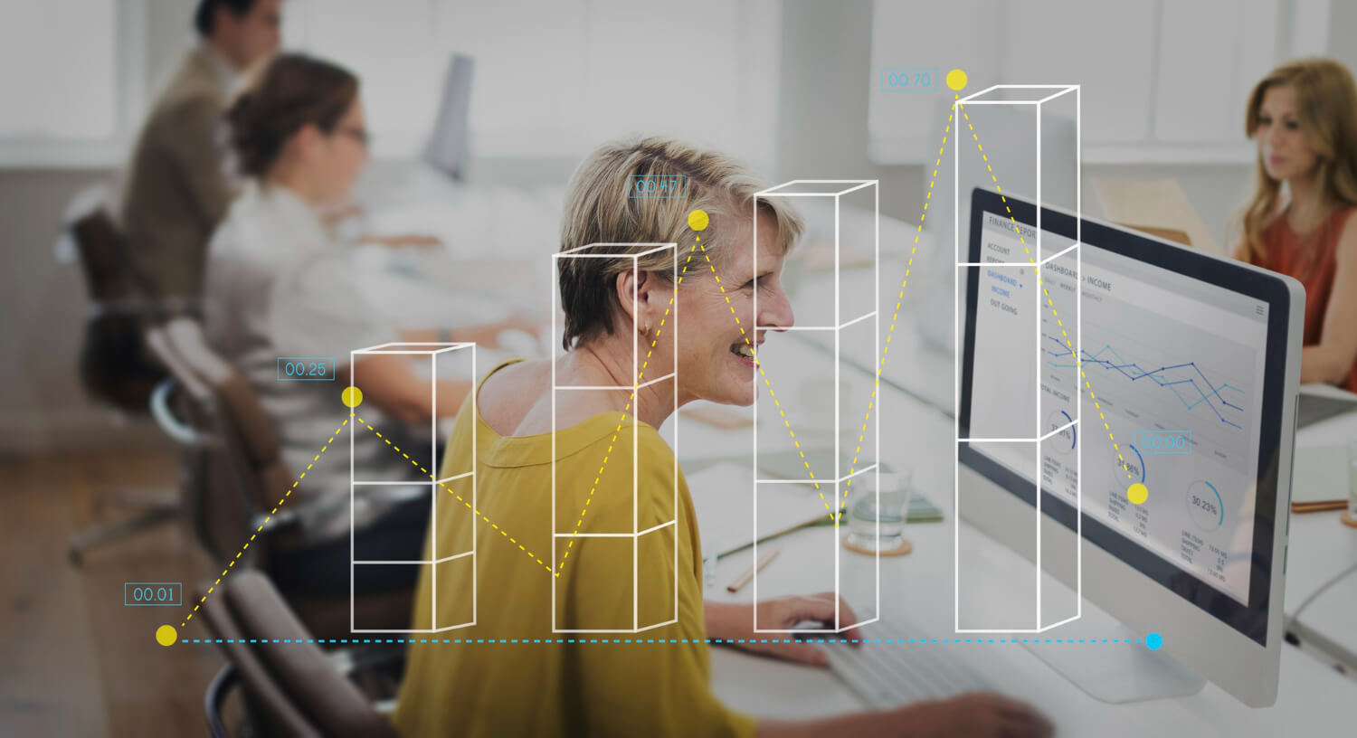 Relaxed and focused employee working at her desk in a modern office