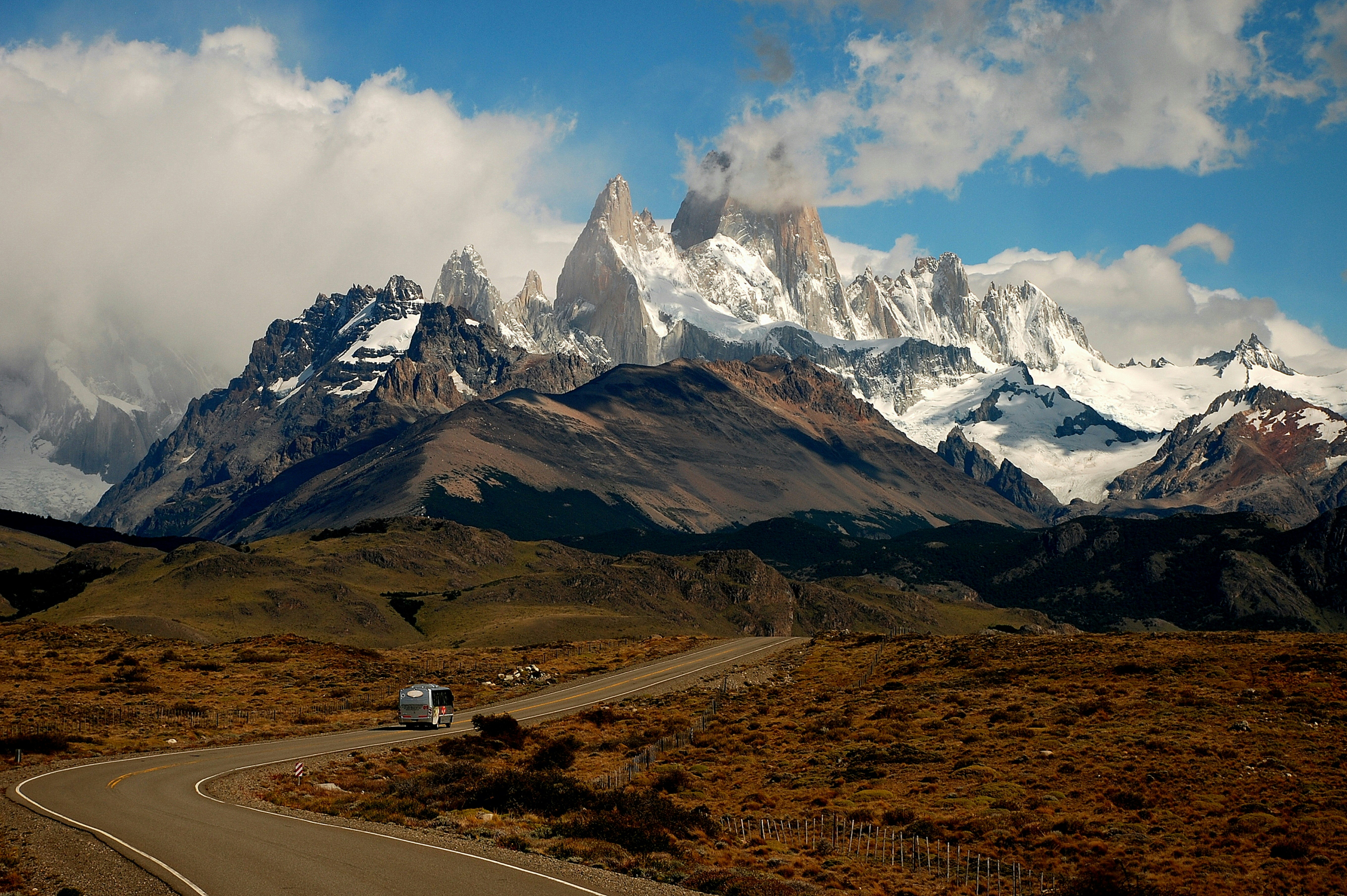 Remote snowy mountain landscape, representing global destinations.