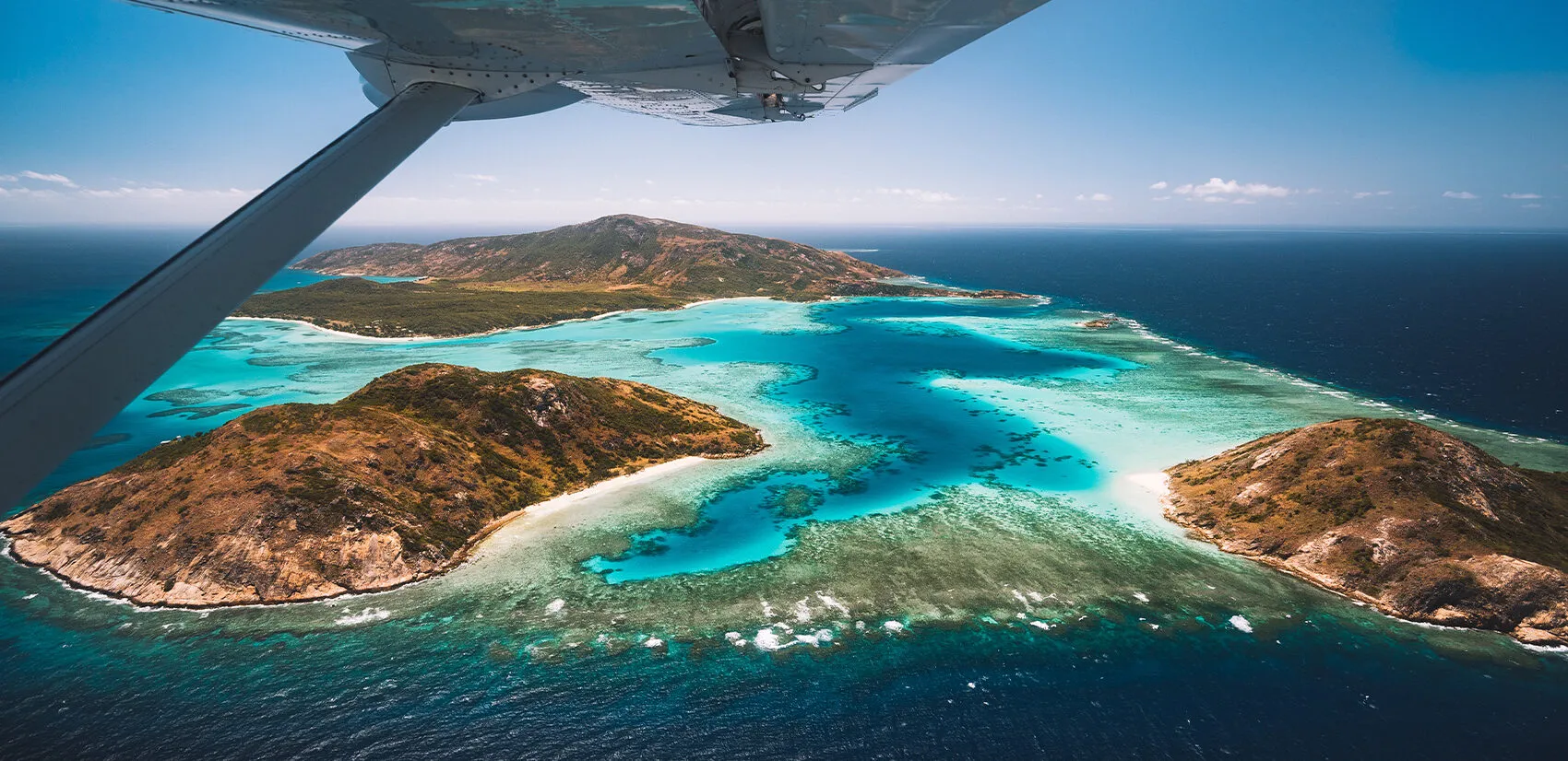 Lizard Island and The Whitsundays offer two spectacular, turquoise Australian escapes. This guide compares reef access, luxury levels, privacy, and activities to find your perfect island retreat.