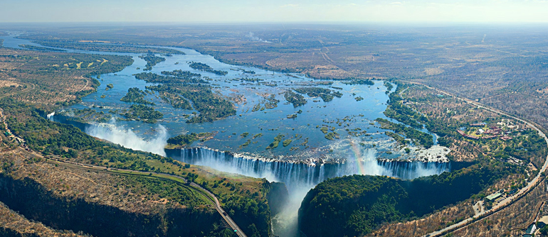 Planning a trip to Victoria Falls? This guide explains the pros and cons of high water (power/spray) vs. low water (visibility/Devil's Pool access) to help you choose the best time to visit.
