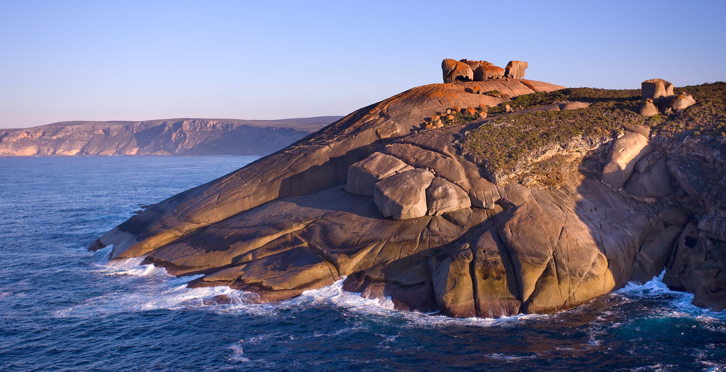 A collection of photographs showcasing Kangaroo Island's unique wildlife and diverse natural landscapes.