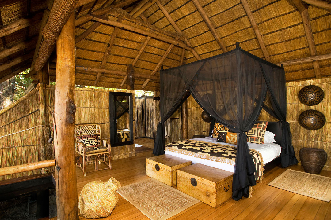 A collection of photographs showcasing walking safaris, river life, and remote safari camps in South Luangwa, Kafue, and Lower Zambezi.