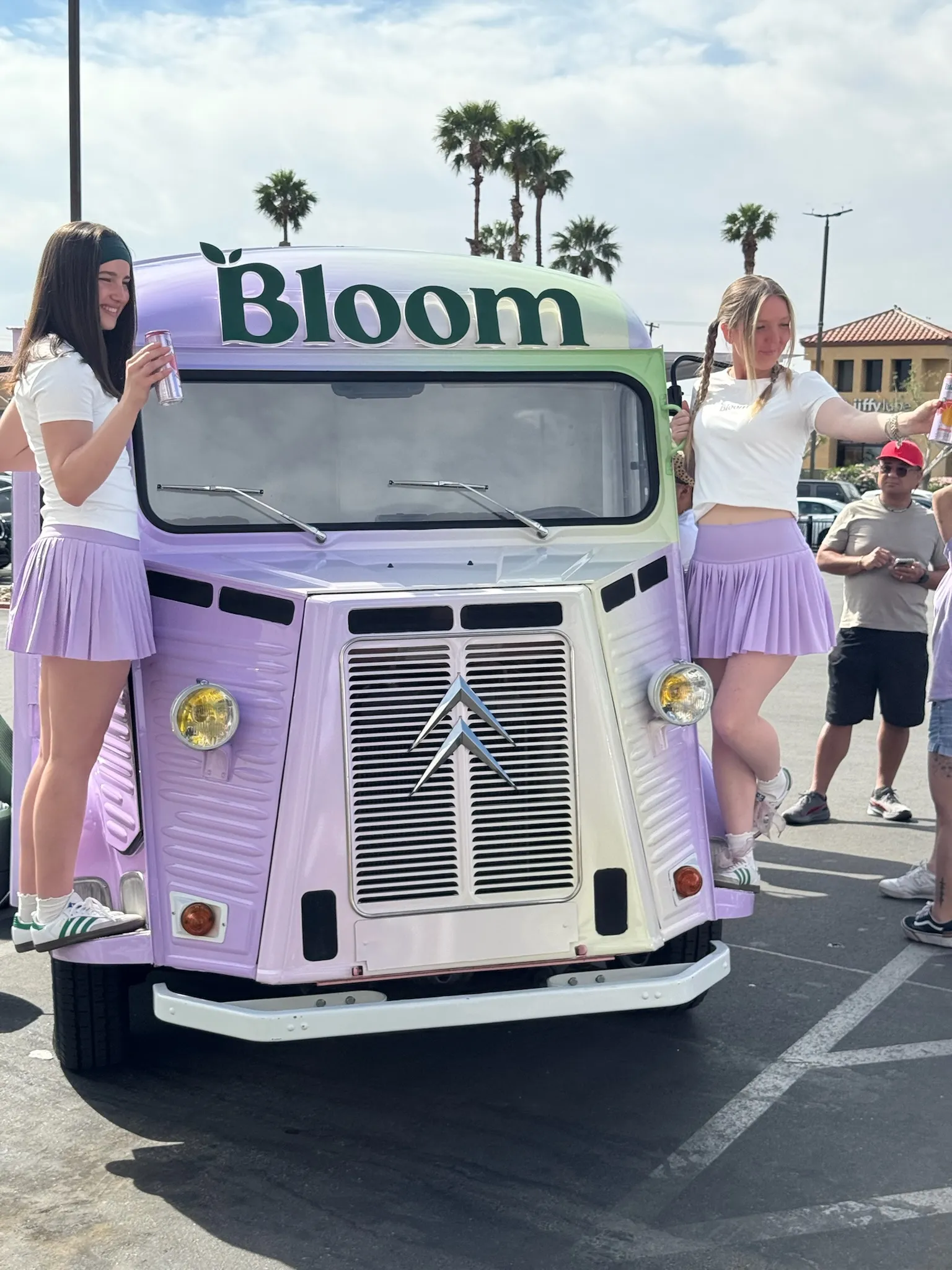 Guests enjoying Lo-Fi Aperitifs beside the branded pink Citroën HY Spritz Van at The Rady Shell in San Diego.