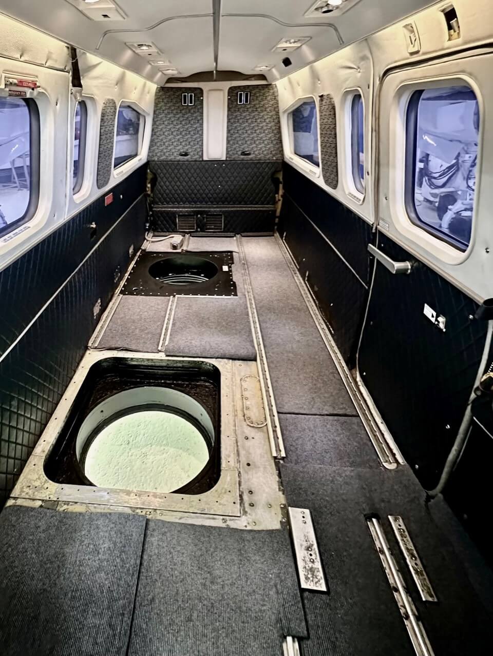 Interior view of two camera hatches inside a Twin Commander 690c