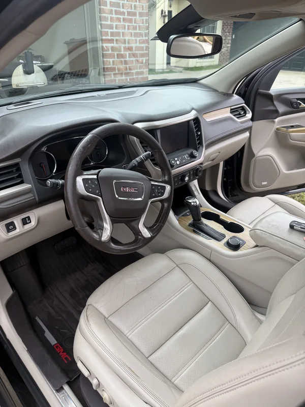 GMC Acadia tan leather interior after full detail and leather conditioning in Baton Rouge