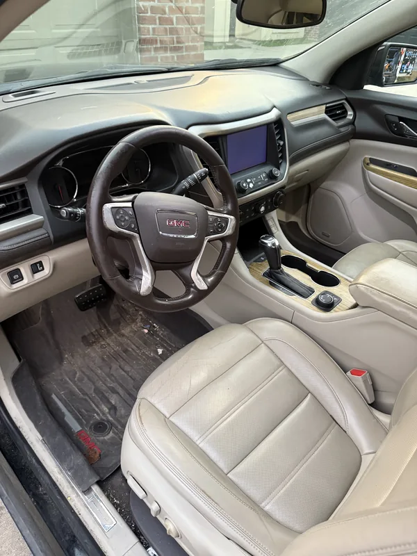 GMC Acadia tan leather interior before cleaning and conditioning in Baton Rouge