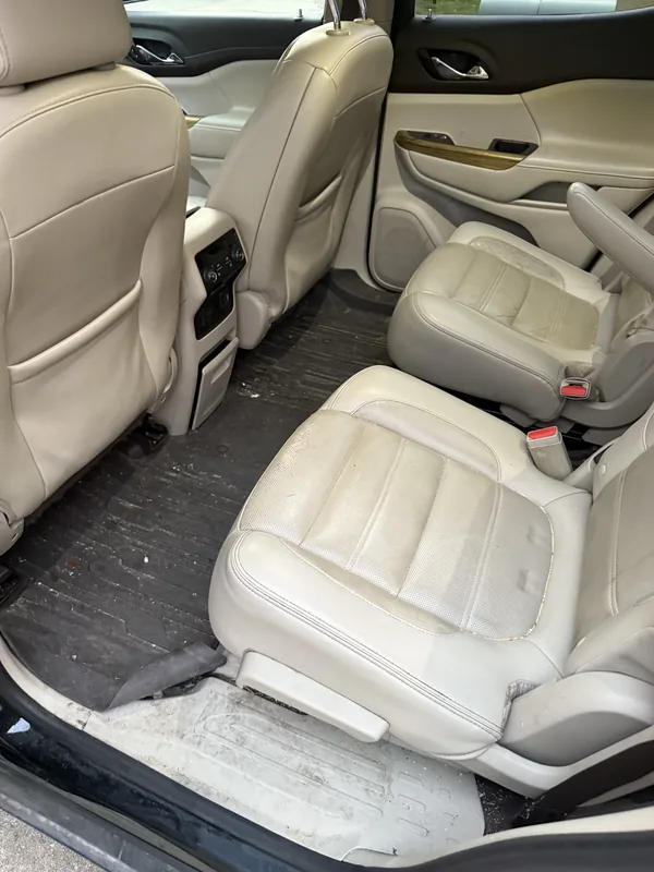 GMC Acadia rear seats before deep clean and extraction in Baton Rouge