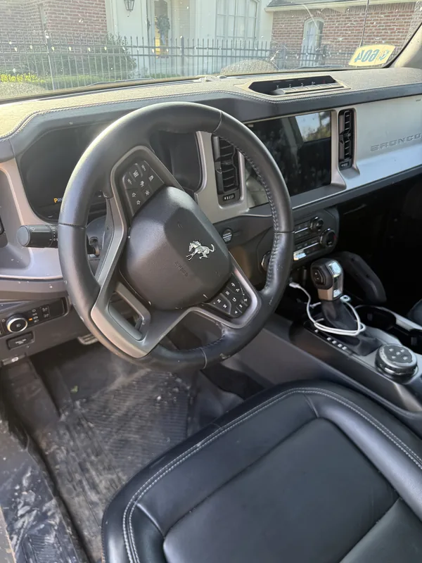 Ford Bronco black interior before deep cleaning in Baton Rouge