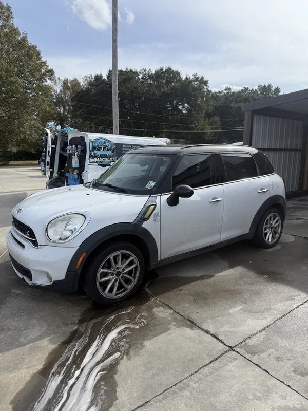 White Mini Cooper Countryman before exterior detail in Baton Rouge