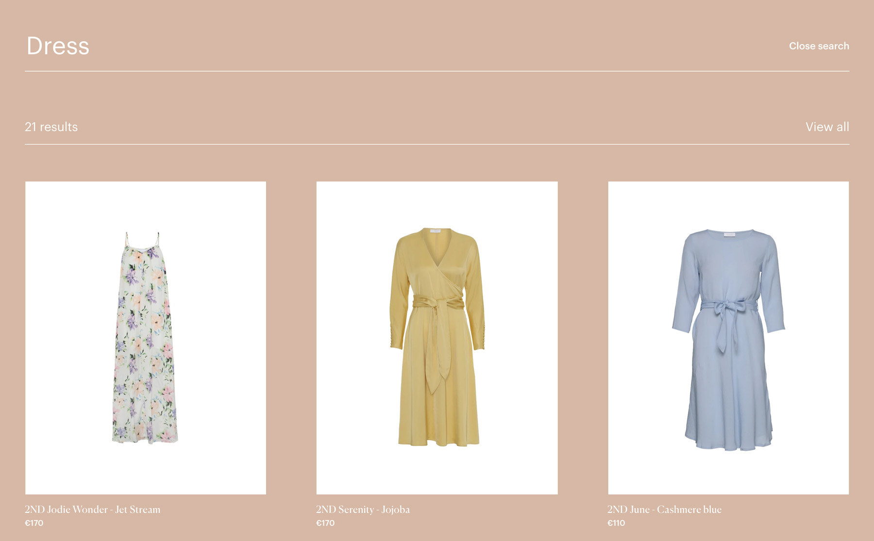 Three dresses in a preview display when using the search function in the 2NDDAY webshop. You can choose one or see all.