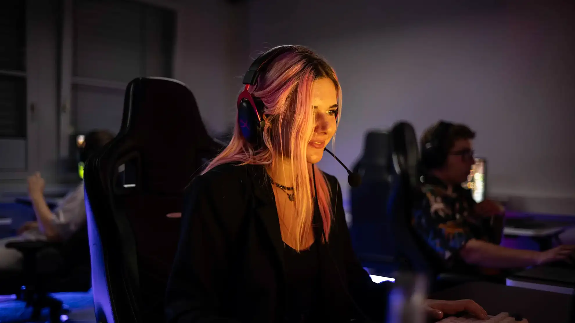 Outtake of purple and orange colored pixels from the Nordisk Games website.