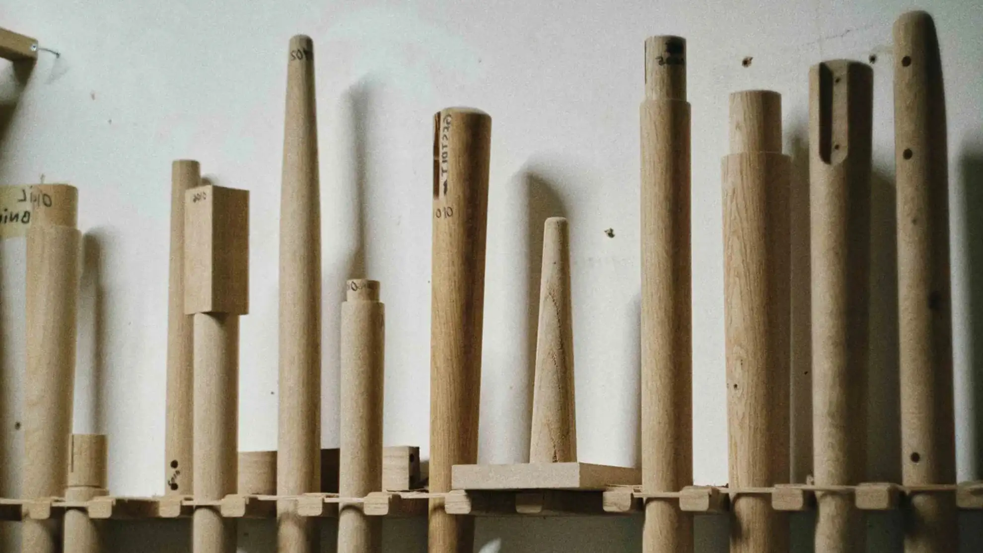 Wood pillars in different sizes at a wood workshop.