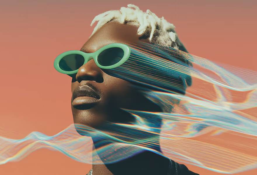Stylish portrait of a person with white hair, green sunglasses, and silver chains, set against a vibrant gradient background.