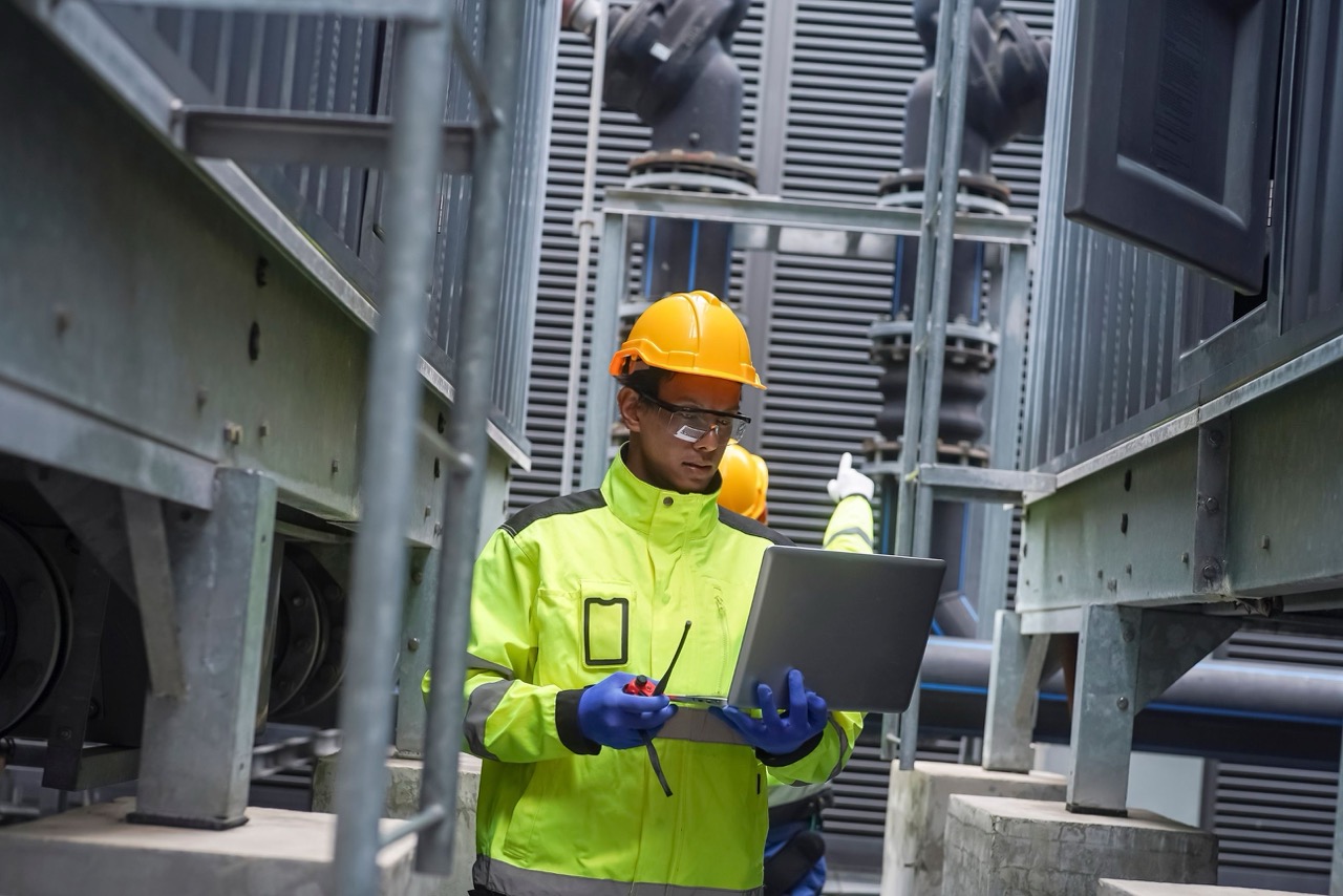 utility worker going through data