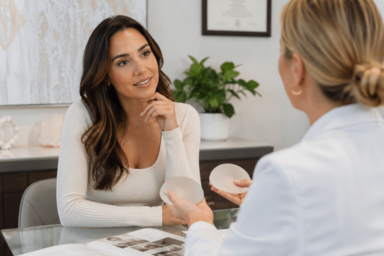 Woman consulting a surgeon about silicone breast implant options in Palm Desert, California