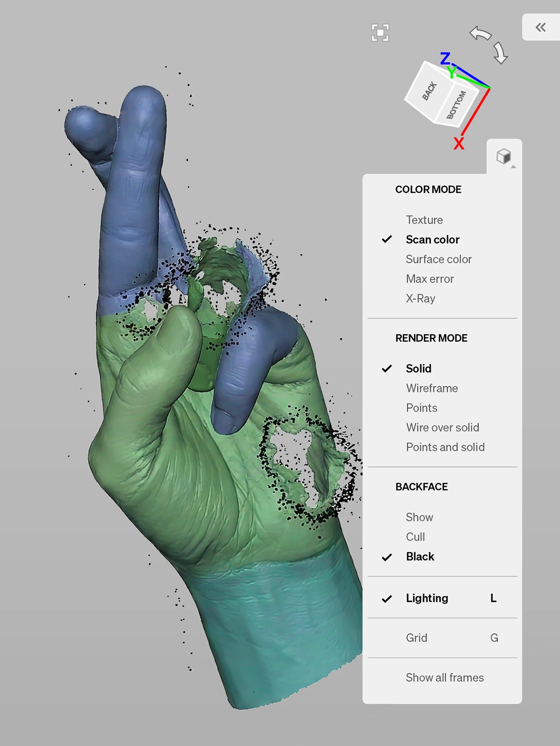 PSEUDONYM Spring Summer 2020 technical scan capture showing a 3D hand model in scan-color mode, with visible mesh gaps, point-cloud artifacts, and interface controls from the digital reconstruction process.