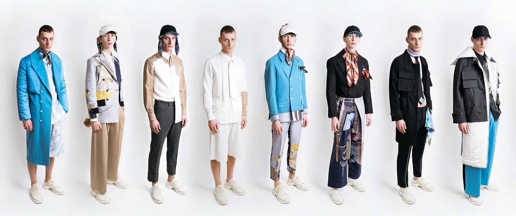 Eight menswear looks from PSEUDONYM Autumn Winter 2019, combining tailoring, outerwear, and technical construction.