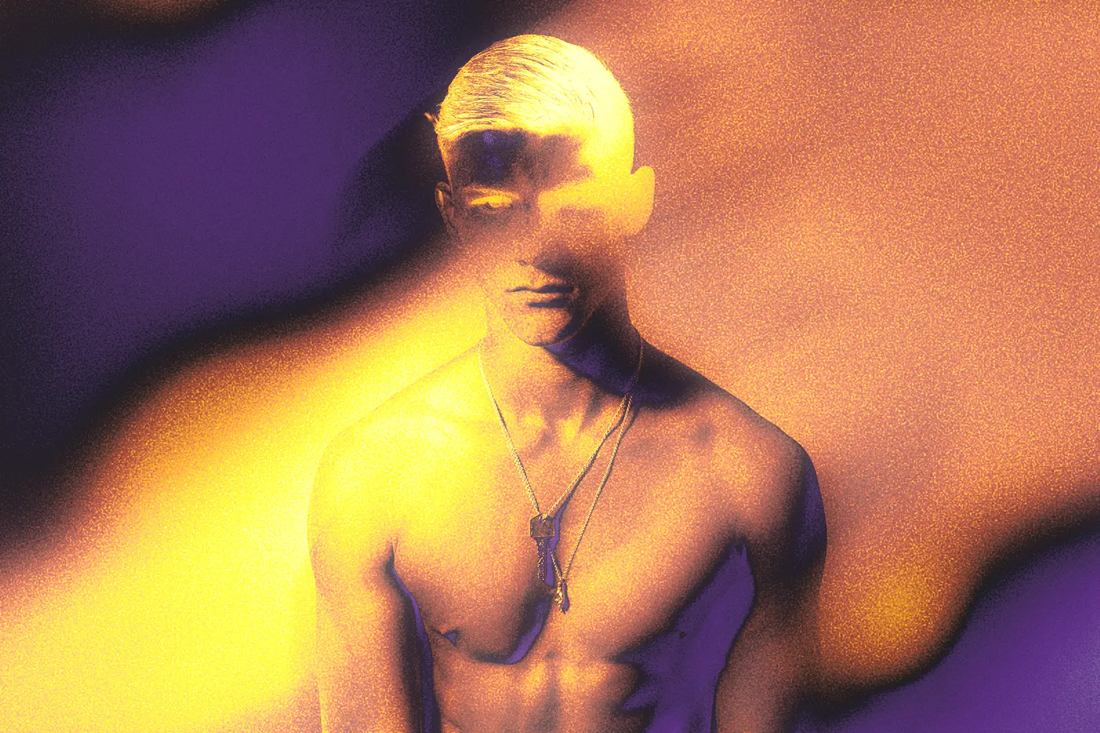 Portrait from the SS20 collection campaign with a male model obscured by warm yellow and purple motion-blur lighting.
