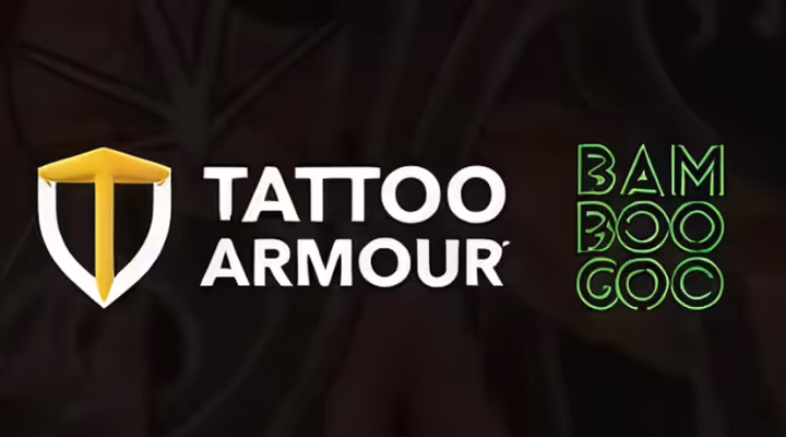 Tattoo Armour logo with a gold and white shield and 'BAMBOO GOC' text in green on a dark background.