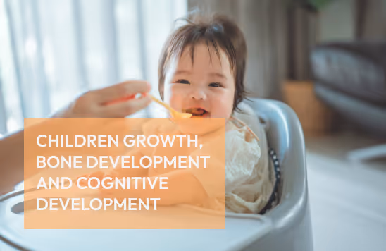 Smiling baby with food on face being fed with a spoon in a high chair, with text about children growth, bone development, and cognitive development.